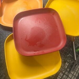 Plates set of 4. 8x8 vintage Tupperware.  These have been well used.